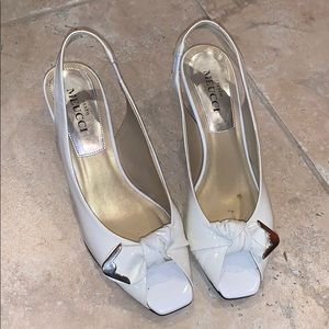 White patent Meucci slingback wedges